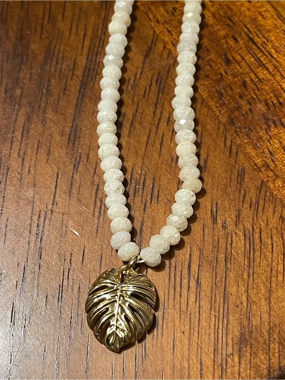 Gold Monstera Leaf Pendant Necklace with Cream Beads